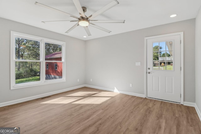 entryway featuring ceiling fan and light wood-type flooring