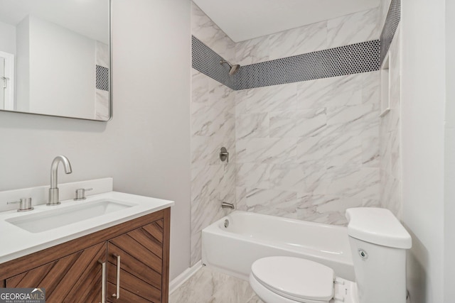 full bathroom with vanity, toilet, and tiled shower / bath combo