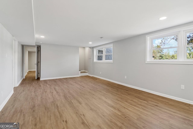 basement featuring light hardwood / wood-style floors