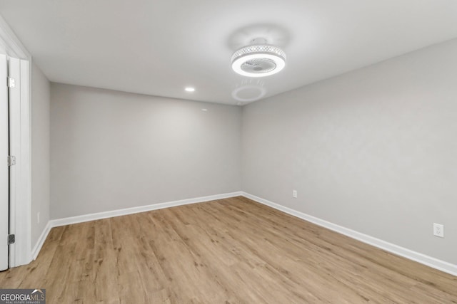 unfurnished room featuring light wood-type flooring