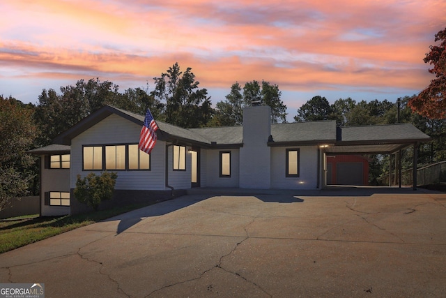 view of front of house with a carport