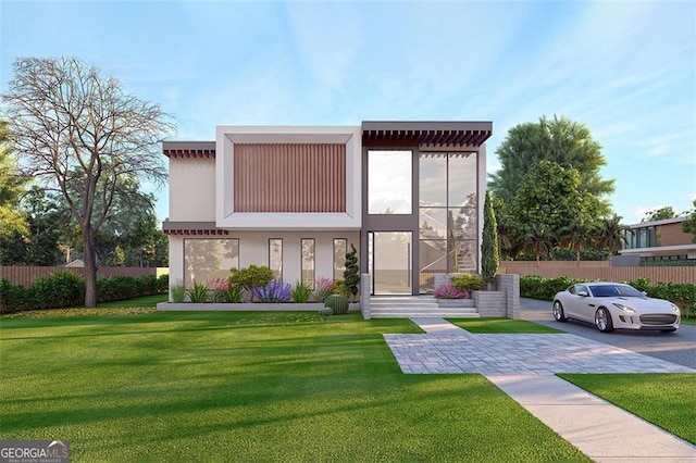 contemporary home featuring a front yard