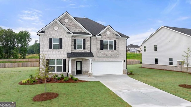 view of front facade featuring a garage and a front lawn