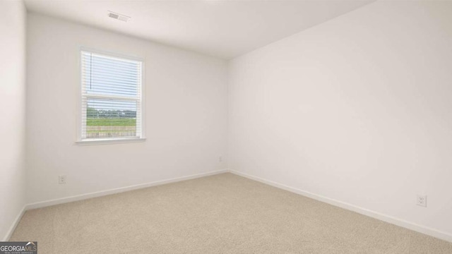 view of carpeted spare room