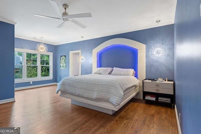 bedroom featuring ceiling fan and dark wood-type flooring