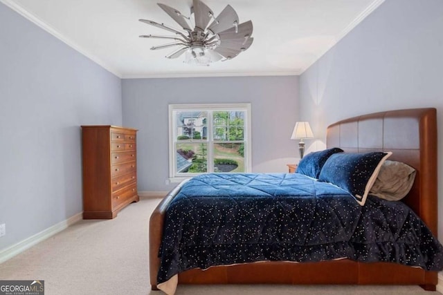 bedroom featuring carpet, ceiling fan, and ornamental molding