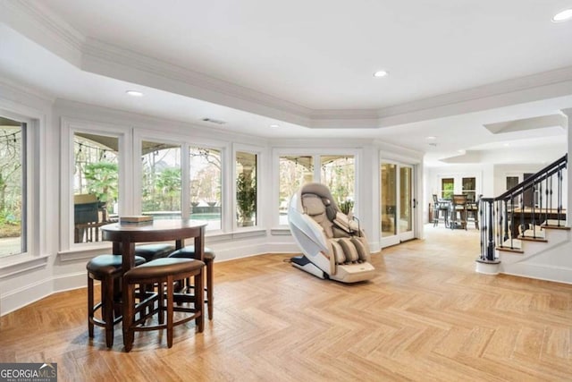 sunroom with a tray ceiling