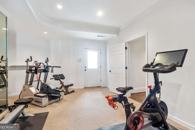 workout area with crown molding