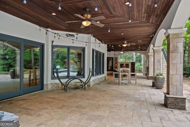 view of patio / terrace with french doors and ceiling fan