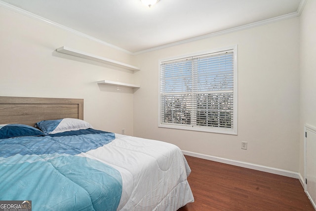 bedroom featuring crown molding and dark wood-type flooring