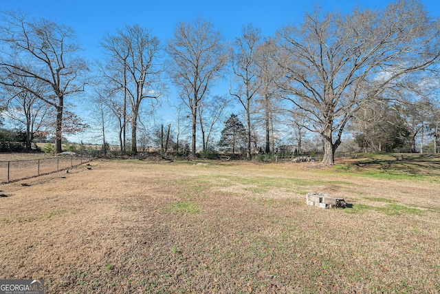 view of yard with a rural view