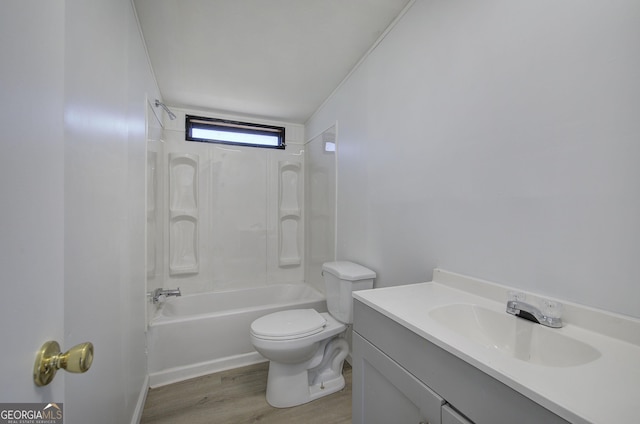 full bathroom featuring toilet, vanity, wood-type flooring, and tub / shower combination