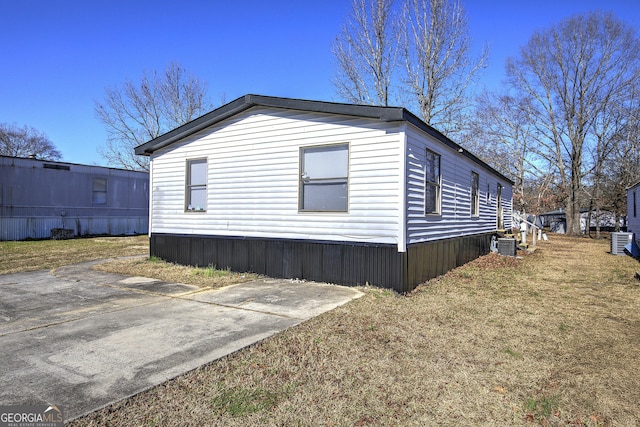 view of home's exterior with cooling unit