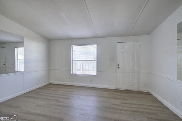 unfurnished room featuring light hardwood / wood-style flooring