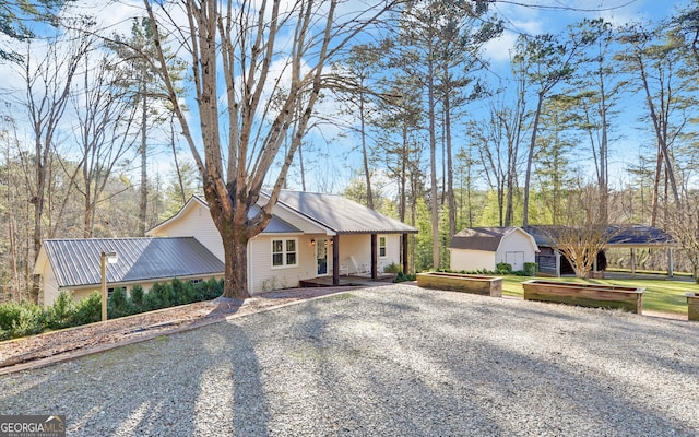 single story home with a storage unit