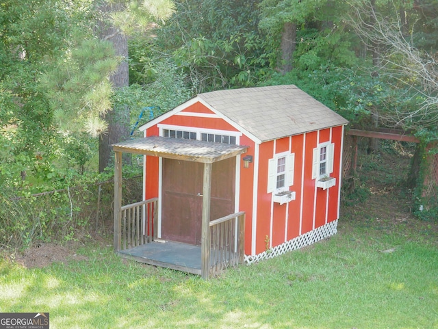 view of outdoor structure with a lawn