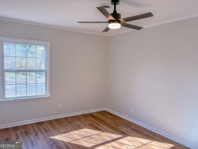 unfurnished room with ceiling fan, ornamental molding, and light hardwood / wood-style floors