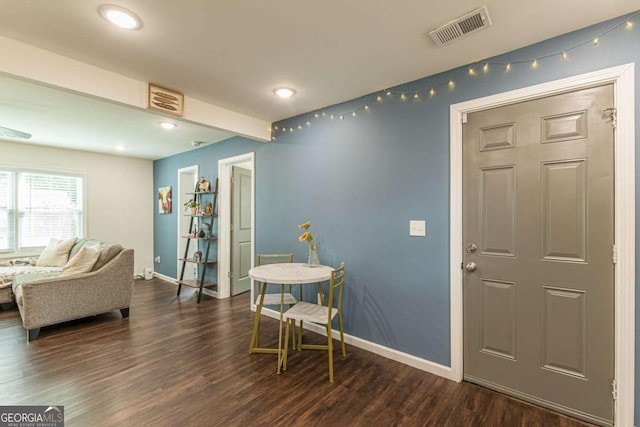 interior space with dark wood-type flooring