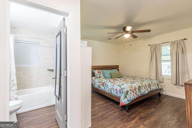 bedroom featuring ceiling fan and dark hardwood / wood-style flooring