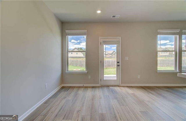 empty room featuring light hardwood / wood-style floors