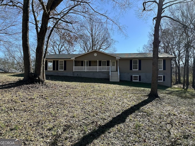 ranch-style home with covered porch