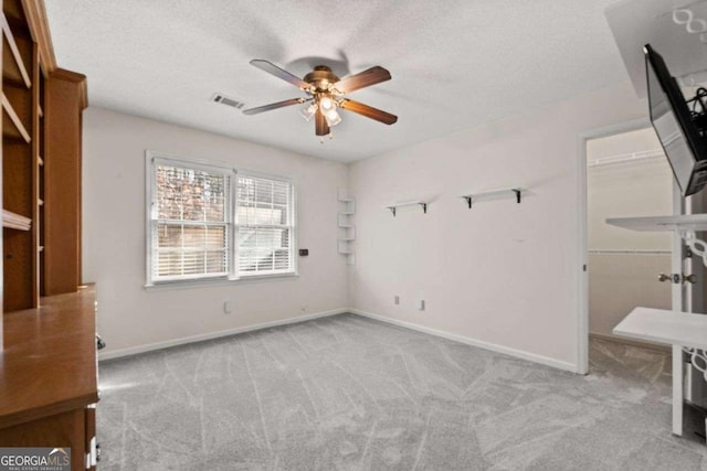 4116 River Cliff Chase SE, Marietta, GA 30067 - empty room featuring a ceiling fan, carpet floors, and a textured ceiling