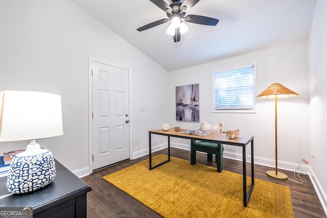 office area with dark wood finished floors, vaulted ceiling, baseboards, and ceiling fan