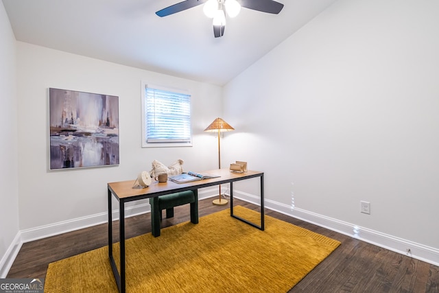 office space featuring lofted ceiling, ceiling fan, baseboards, and wood finished floors