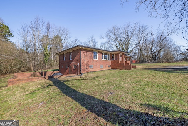 view of property exterior with a yard