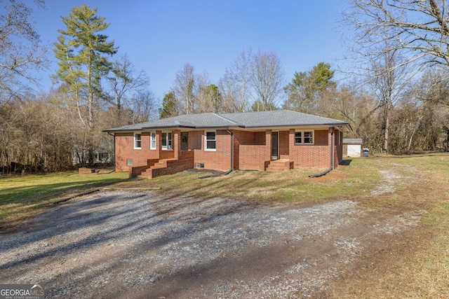 ranch-style house with a front yard