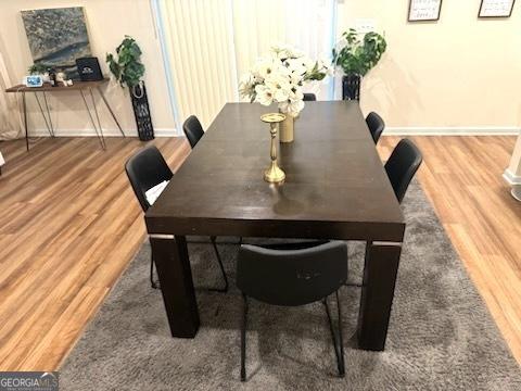 dining room with hardwood / wood-style floors