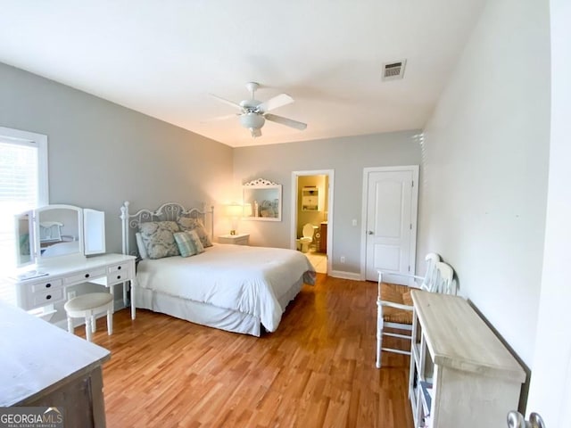 bedroom featuring ceiling fan and hardwood / wood-style flooring