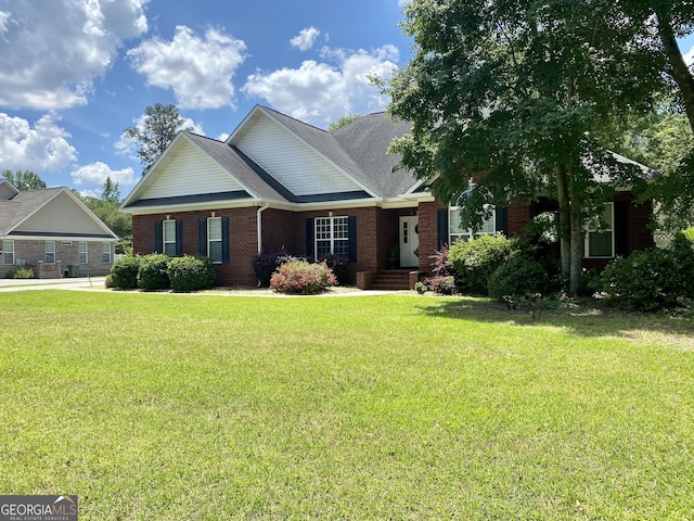 view of front of home with a front yard