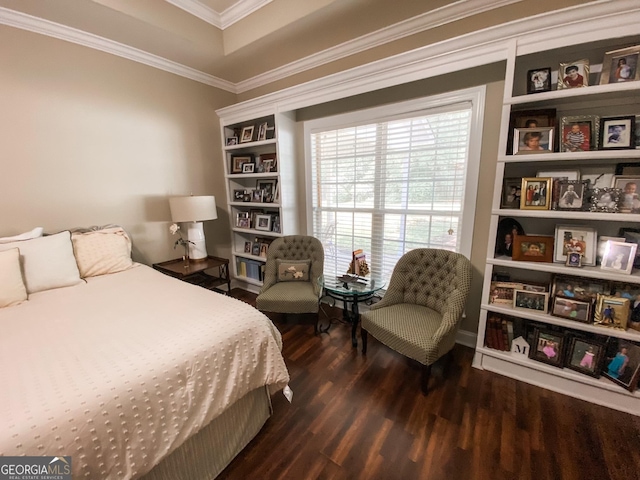 bedroom featuring dark hardwood / wood-style floors and crown molding