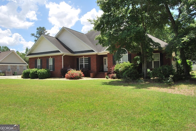 view of front of property with a front lawn