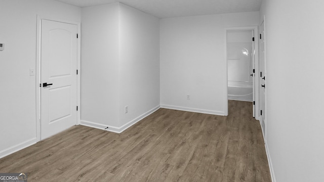 interior space with light wood-type flooring and a closet