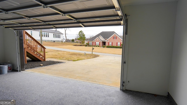 garage featuring a carport