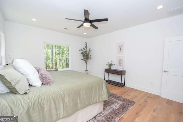 bedroom featuring ceiling fan and light wood-type flooring