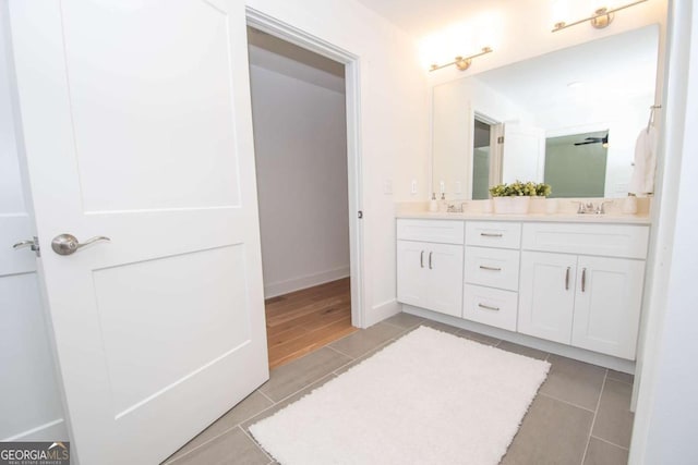 bathroom featuring tile patterned floors and vanity