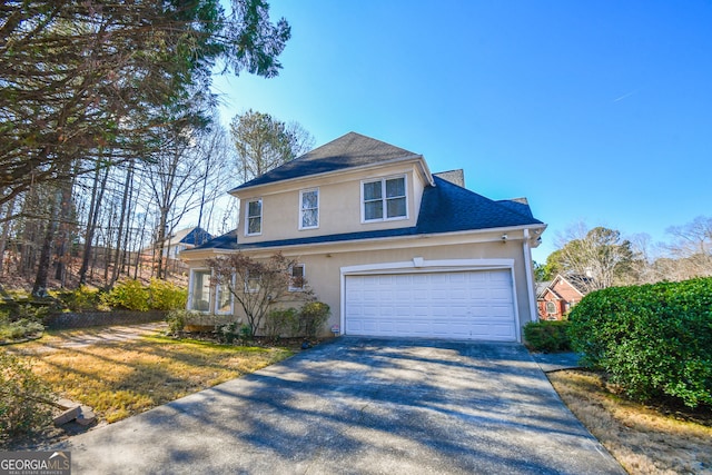 view of property with a garage