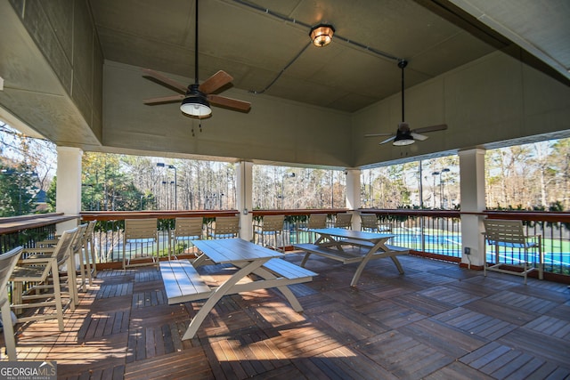 wooden deck with ceiling fan