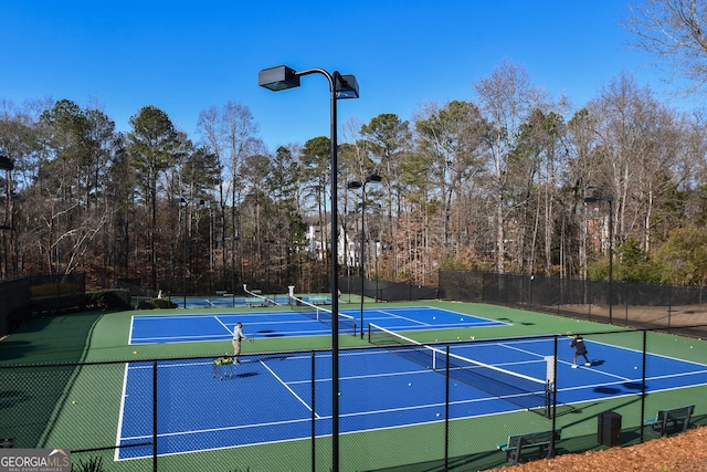 view of sport court featuring basketball court