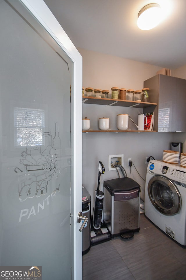 laundry room featuring washer / dryer