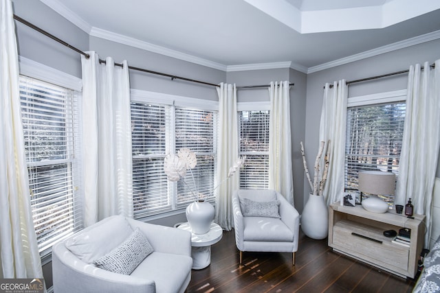 living area featuring ornamental molding and dark wood-type flooring