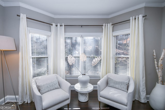 sitting room featuring dark hardwood / wood-style floors and crown molding