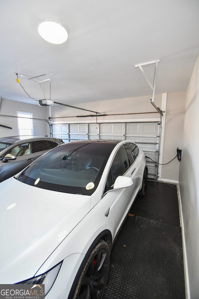 garage featuring a garage door opener