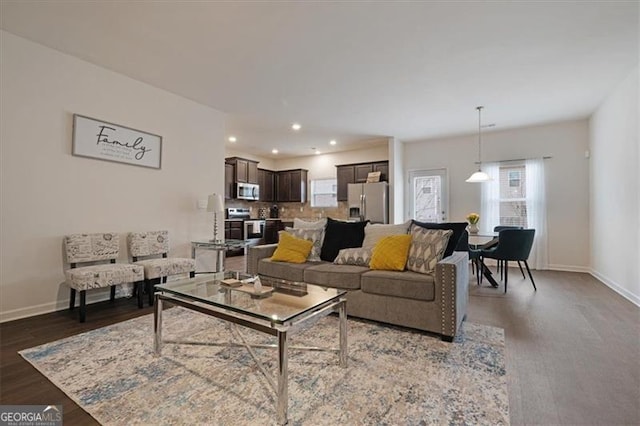 living room featuring dark hardwood / wood-style flooring