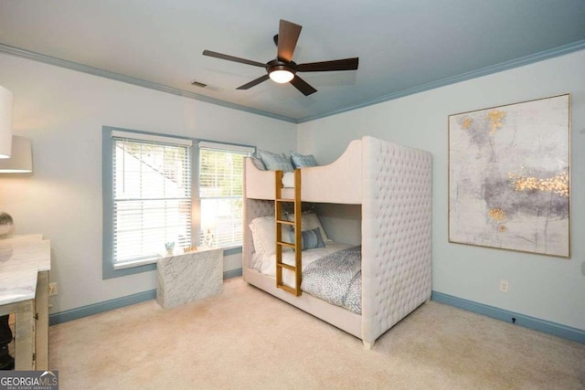 bedroom with light carpet, crown molding, and ceiling fan