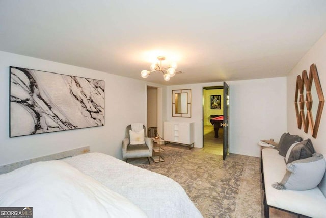 bedroom with a notable chandelier