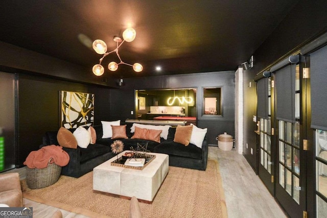 1409 Sheridan Rd NE, Atlanta, GA 30324 - living room featuring wood finished floors and a chandelier